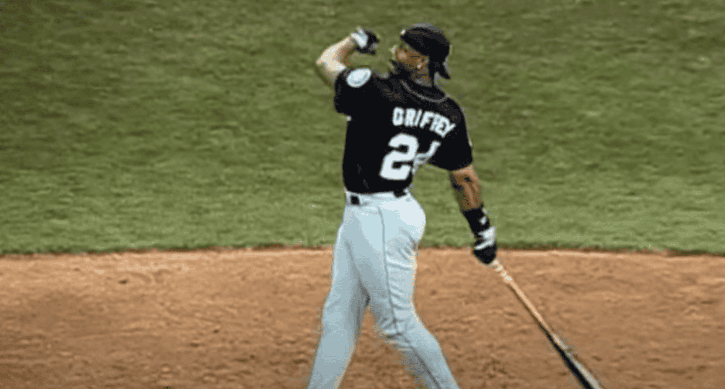 Image of Ken Griffey Jr. demonstrating his famous swing as a top centerfielder.